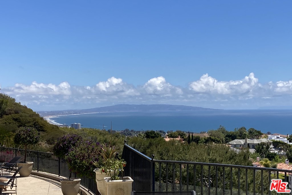 16375 Shadow Mountain Drive Pacific Palisades, CA 90272 - Photo 18 of 50 a view of a balcony with sitting area