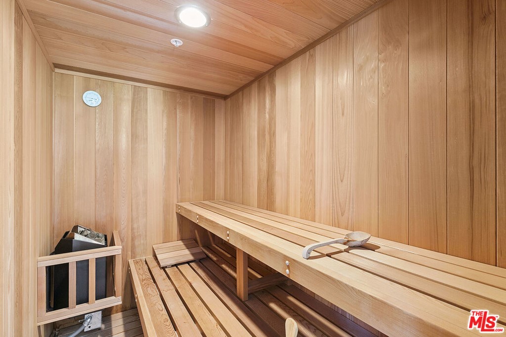 16375 Shadow Mountain Drive Pacific Palisades, CA 90272 - Photo 28 of 50 a view of a balcony with wooden floor and stairs