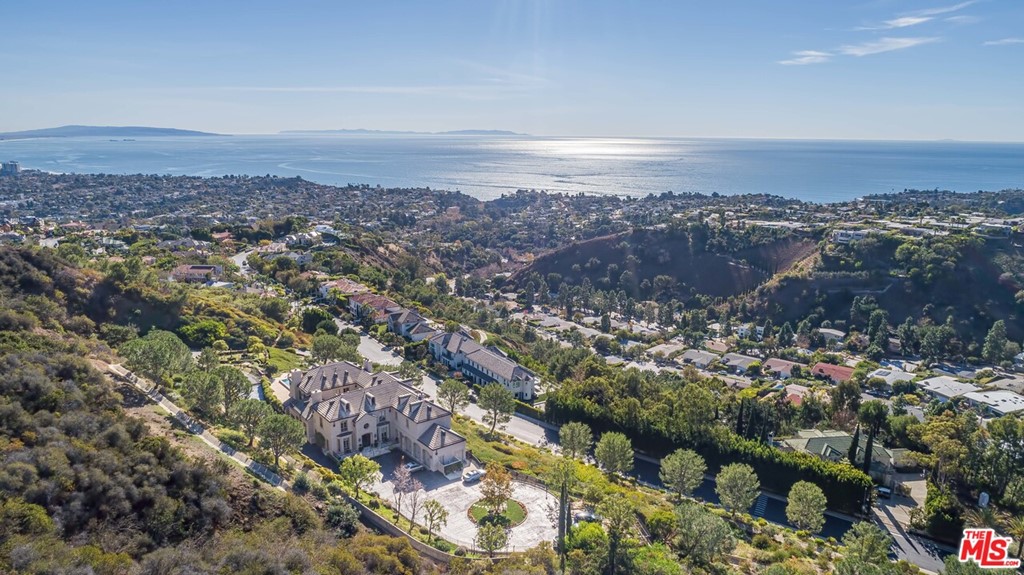16375 Shadow Mountain Drive Pacific Palisades, CA 90272 - Photo 3 of 50 an aerial view of residential building and ocean