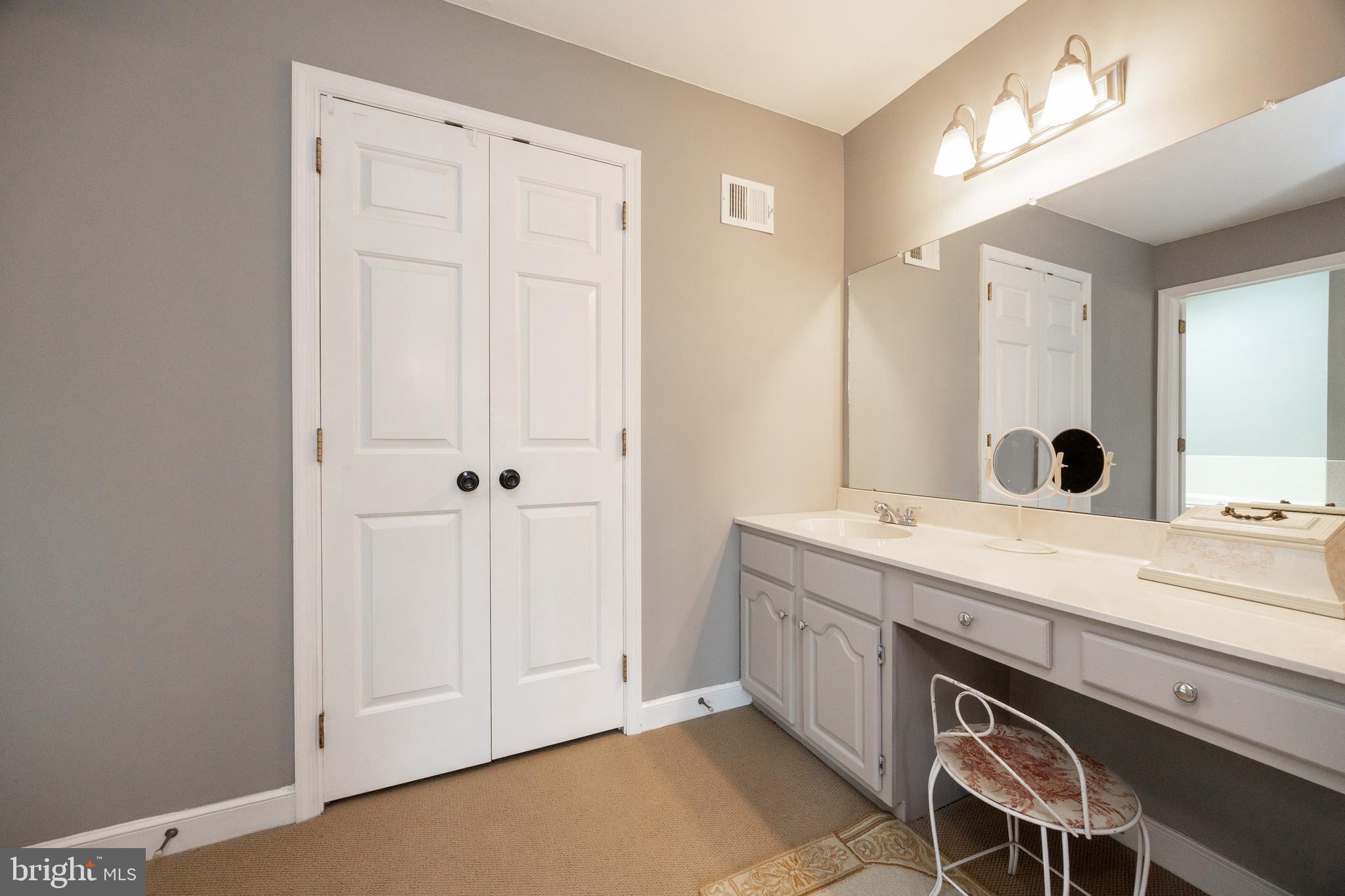 32 McLeod Pond Road Glenmoore, PA 19343 - Photo 38 of 61 walk-in closet & vanity