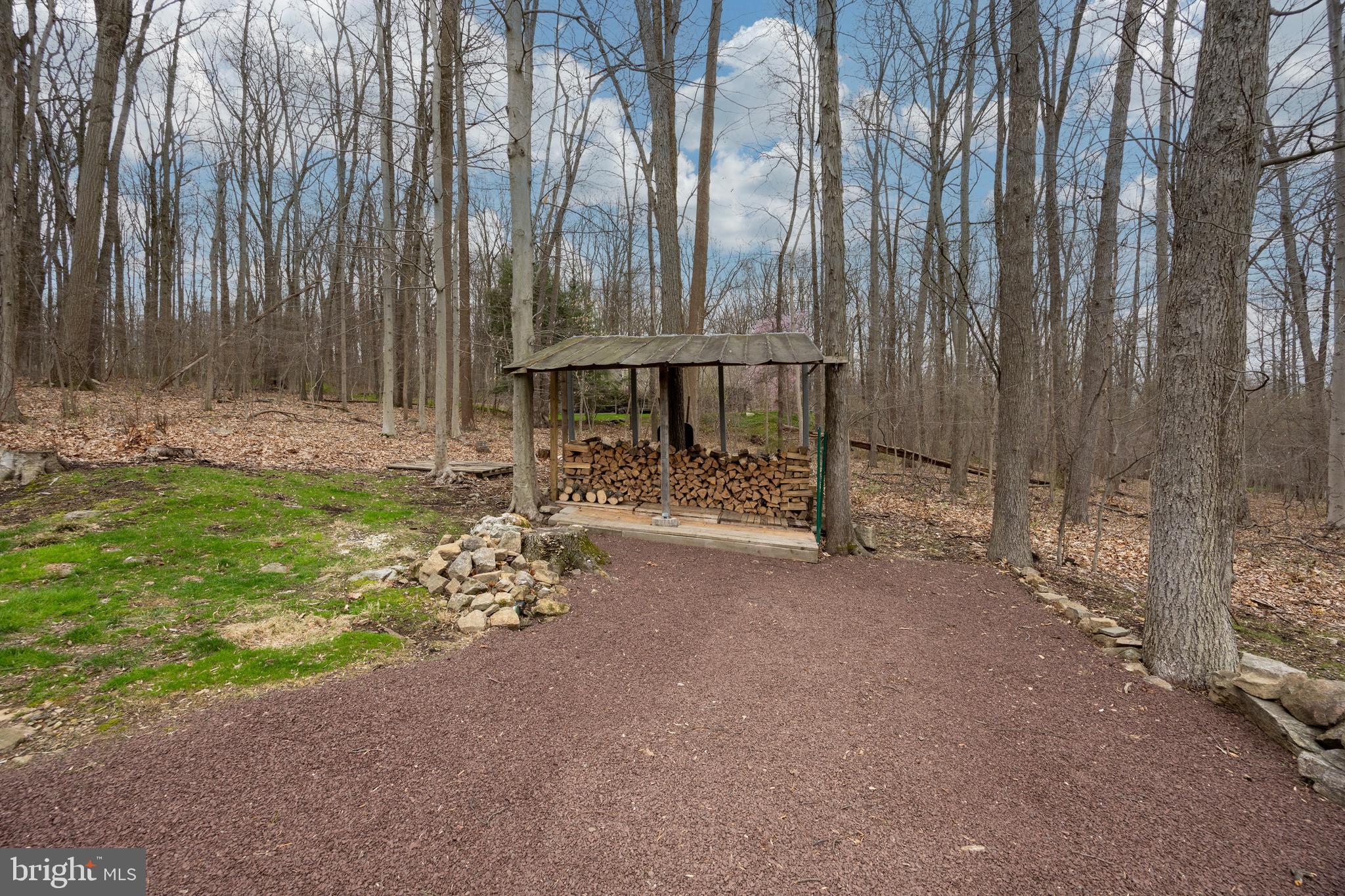 32 McLeod Pond Road Glenmoore, PA 19343 - Photo 55 of 61 Covered Wood Pile