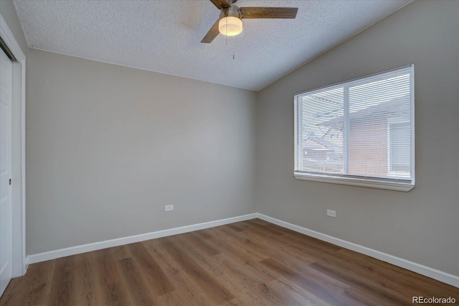 2938 Eliot Circle, Unit 2 Westminster, CO 80030 - Photo 23 of 28 an empty room with a window