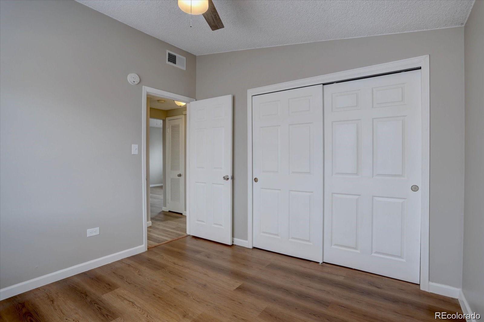 2938 Eliot Circle, Unit 2 Westminster, CO 80030 - Photo 24 of 28 wooden floor in an empty room