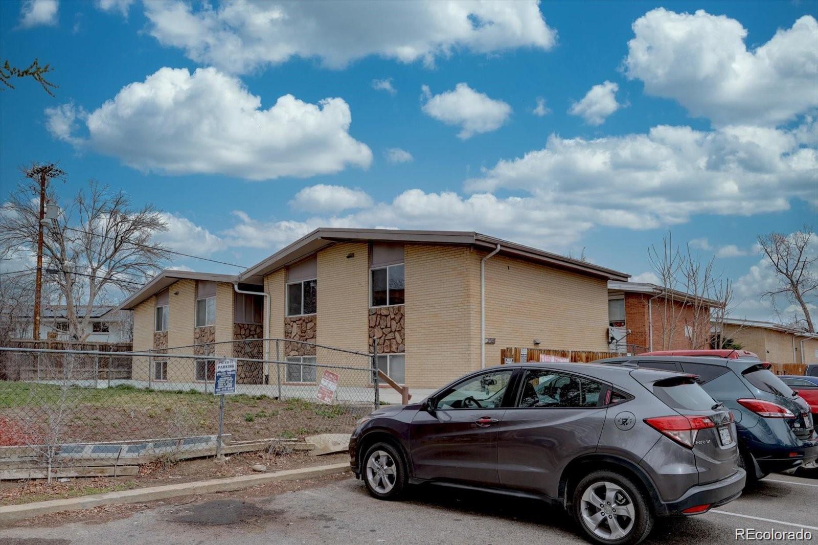 2938 Eliot Circle, Unit 2 Westminster, CO 80030 - Photo 27 of 28 a car parked in front of a house