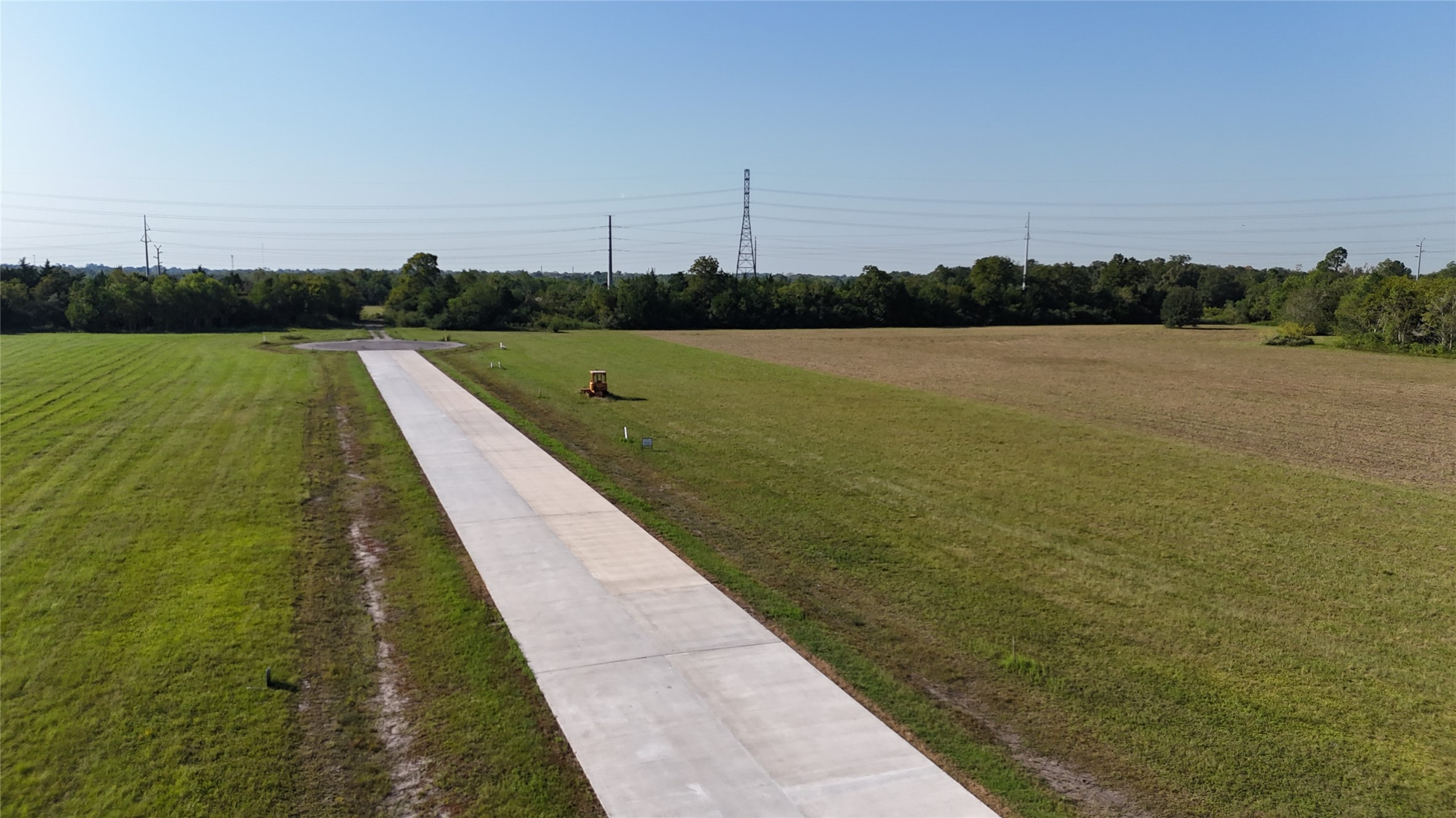 1610 Rymal Road Alvin, TX 77511 - Photo 5 of 7 a view of a lake with a big yard