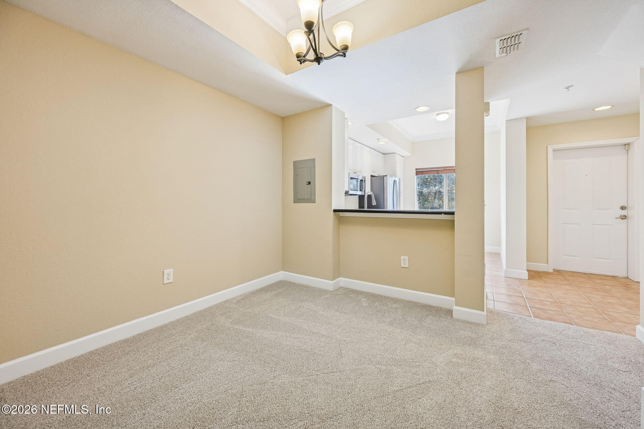 9745 Touchton Road, Unit 2125 Jacksonville, FL 32246 - Photo 14 of 50 a view of a kitchen with a sink and cabinets