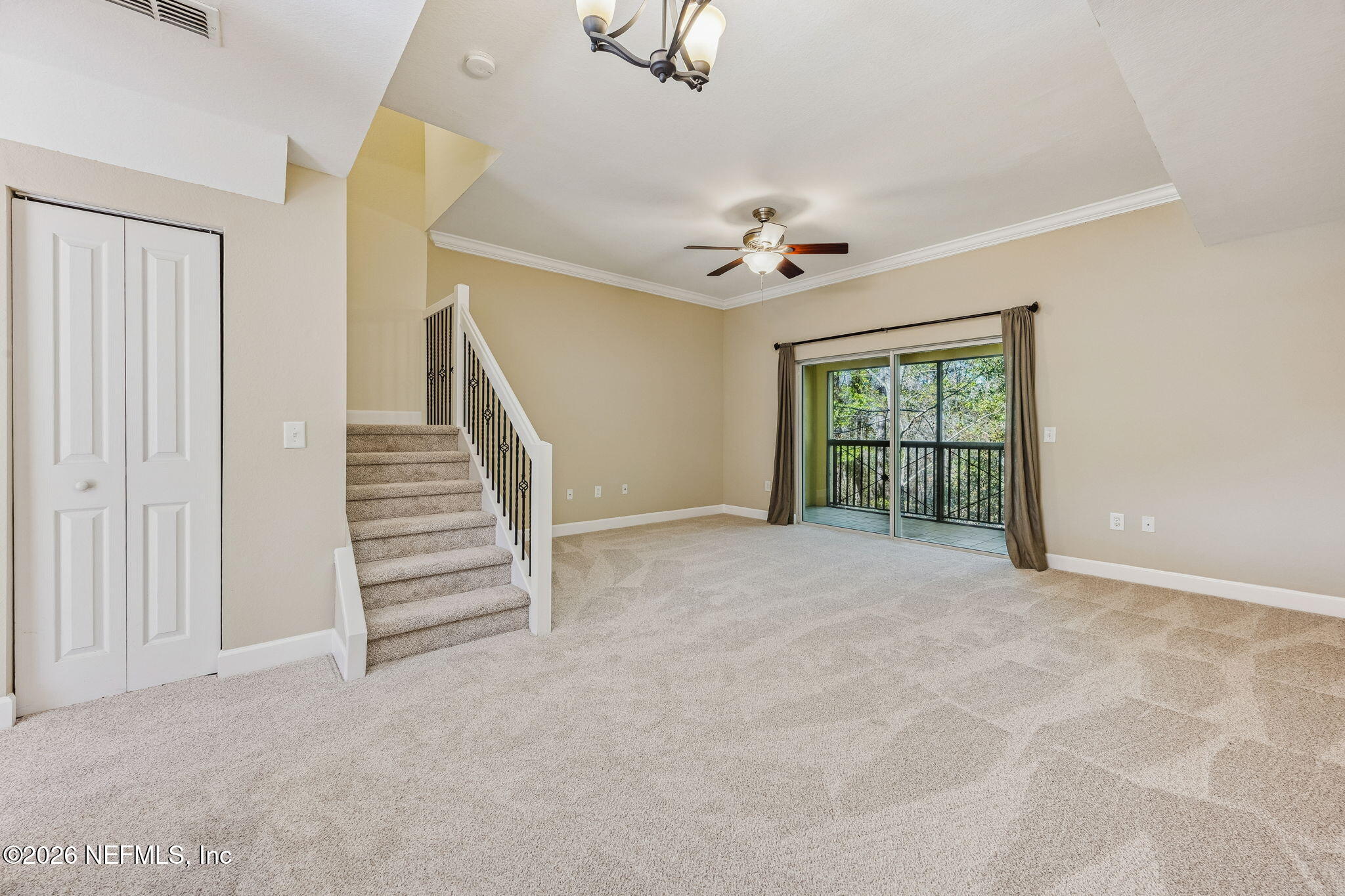 9745 Touchton Road, Unit 2125 Jacksonville, FL 32246 - Photo 16 of 50 a view of an empty room with a window
