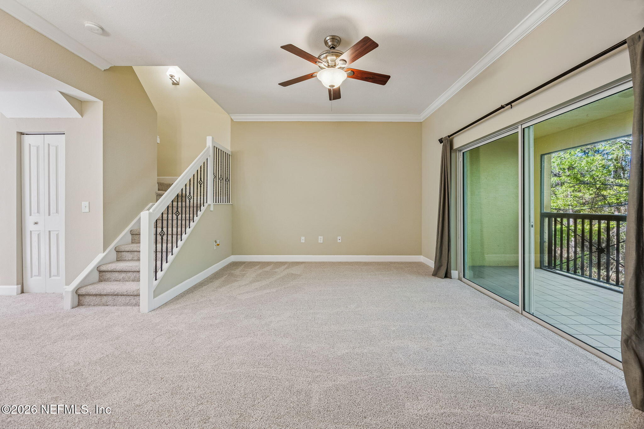 9745 Touchton Road, Unit 2125 Jacksonville, FL 32246 - Photo 17 of 50 wooden floor in a room with a ceiling fan