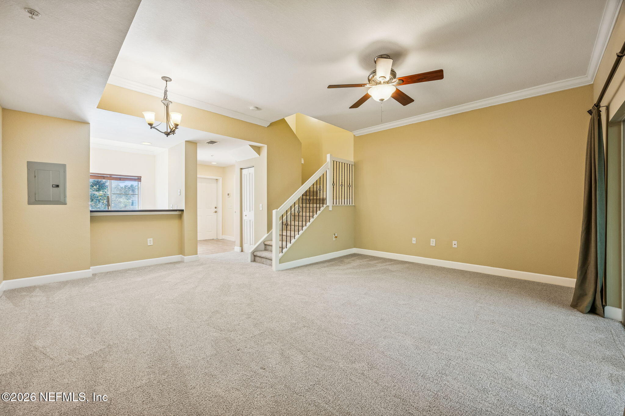 9745 Touchton Road, Unit 2125 Jacksonville, FL 32246 - Photo 18 of 50 a view of an empty room with a window