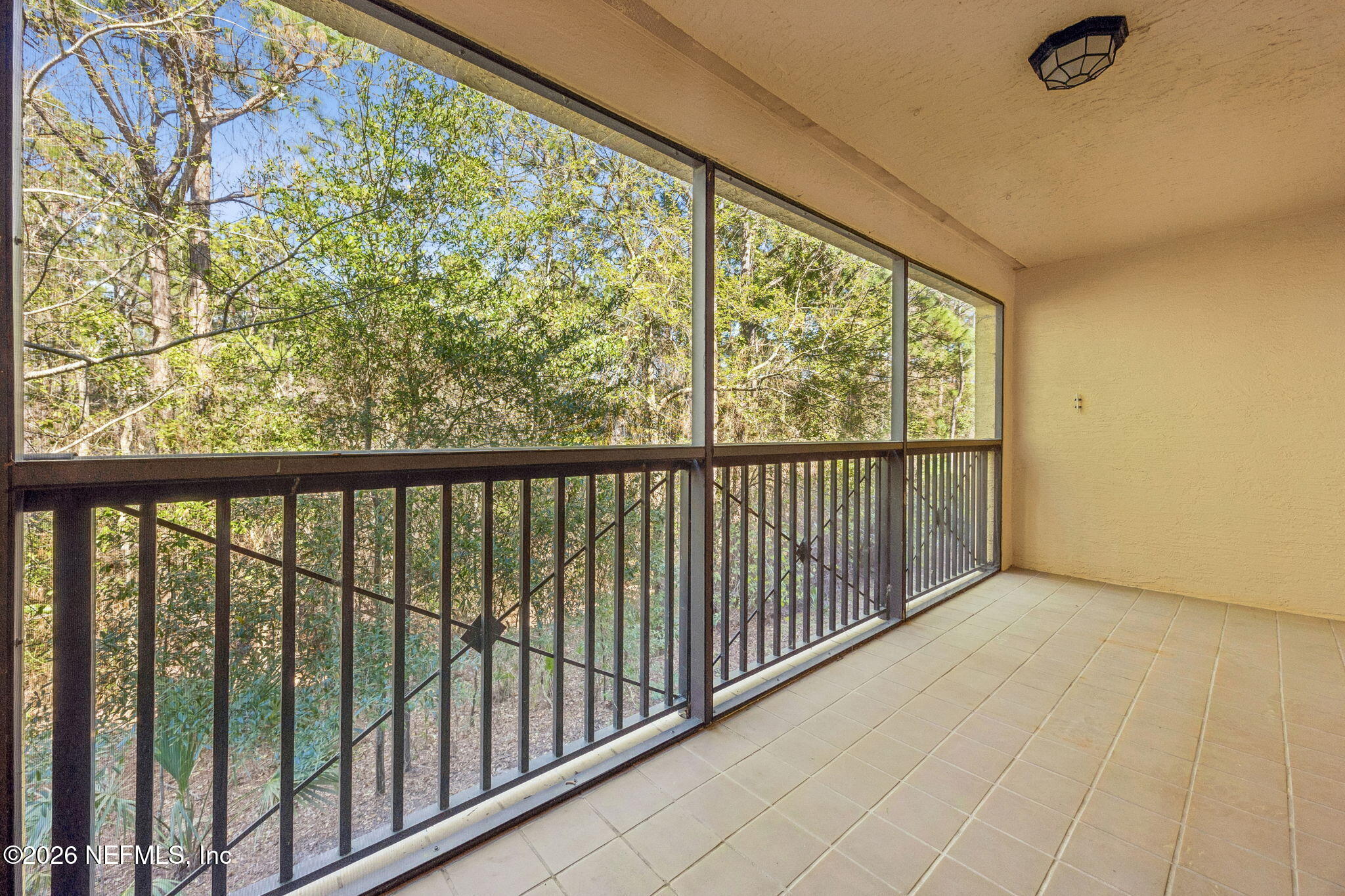 9745 Touchton Road, Unit 2125 Jacksonville, FL 32246 - Photo 36 of 50 a view of a balcony with wooden floor