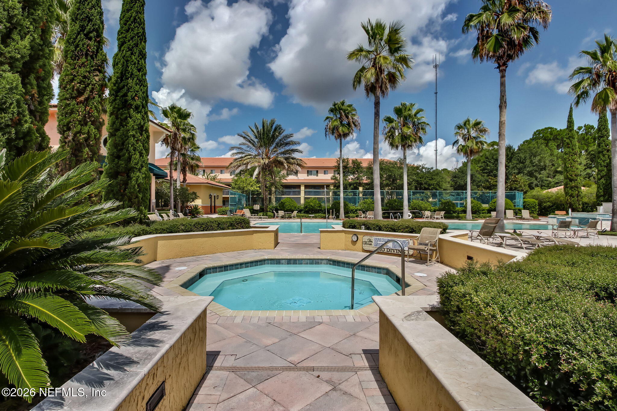 9745 Touchton Road, Unit 2125 Jacksonville, FL 32246 - Photo 45 of 50 a view of a swimming pool with a patio