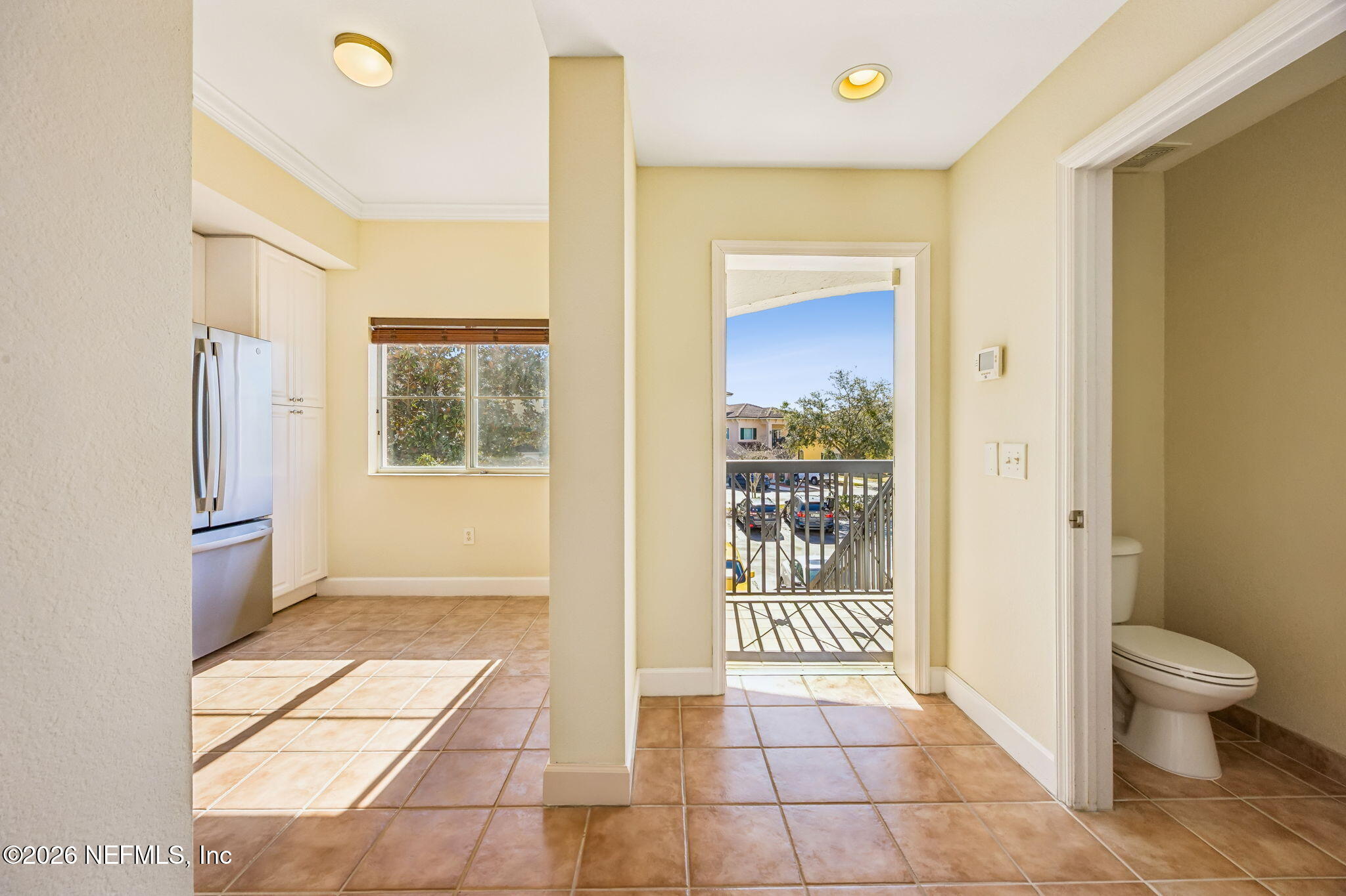 9745 Touchton Road, Unit 2125 Jacksonville, FL 32246 - Photo 8 of 50 a bathroom with a glass door shower a toilet and a sink