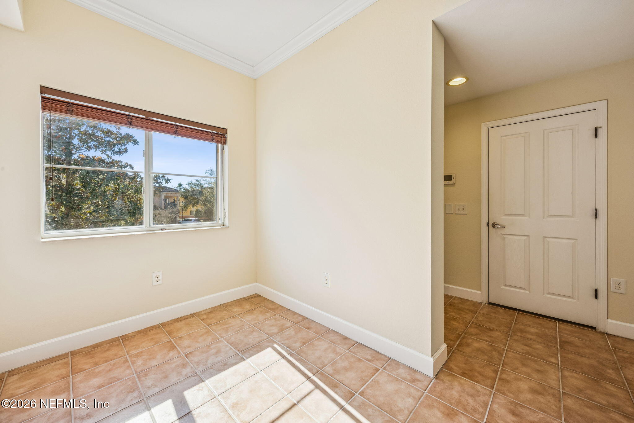 9745 Touchton Road, Unit 2125 Jacksonville, FL 32246 - Photo 9 of 50 an empty room with a window
