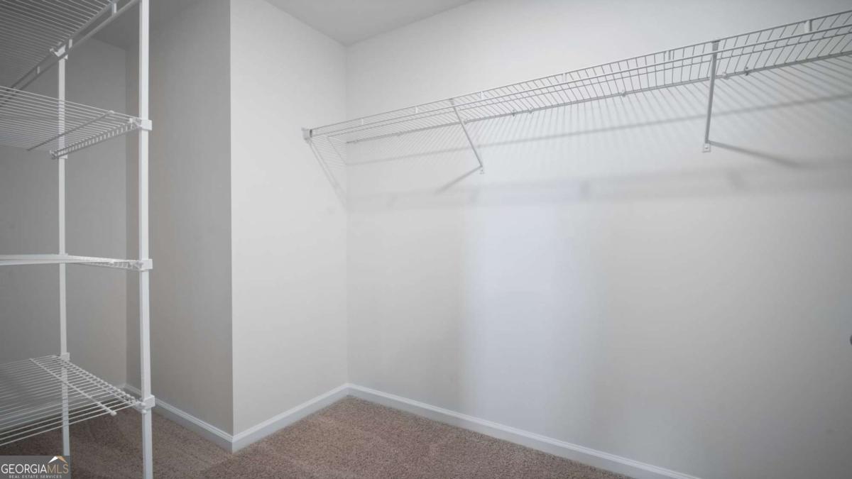 149 Timber Road Statesboro, GA 30458 - Photo 26 of 42 a view of a room with racks on the wall