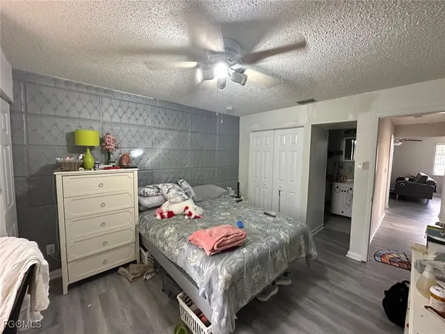 a bedroom with a bed and furniture