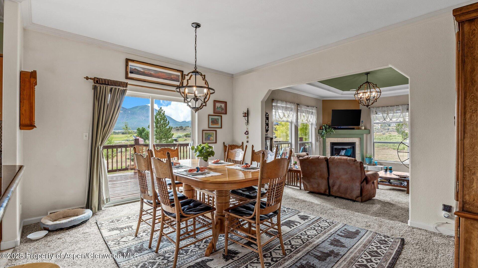 40380 D Road Crawford, CO 81415 - Photo 20 of 52 a view of a dining room with furniture window and outside view