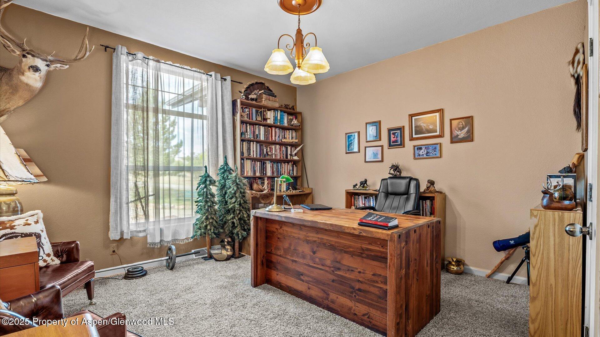40380 D Road Crawford, CO 81415 - Photo 28 of 52 a room with furniture and window