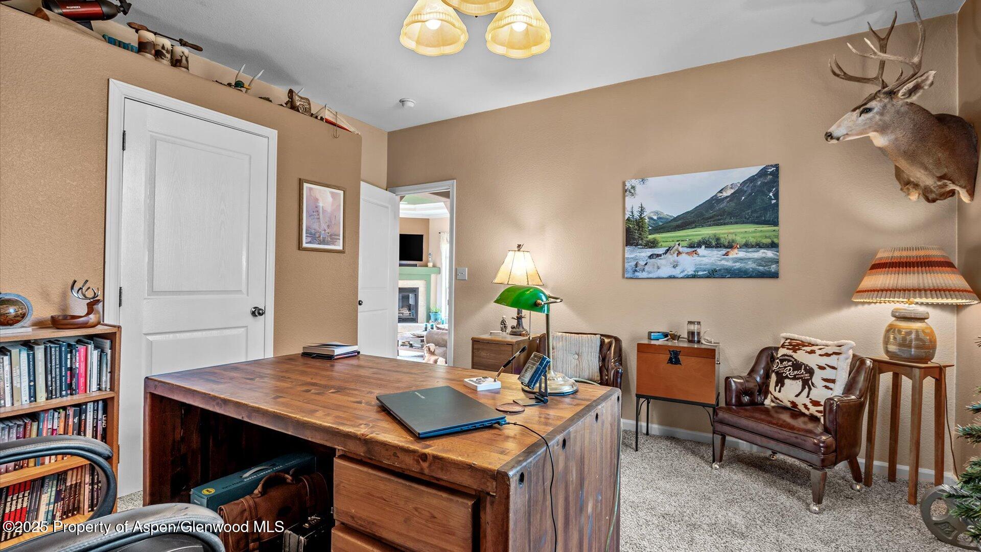40380 D Road Crawford, CO 81415 - Photo 29 of 52 a view of a workspace with furniture