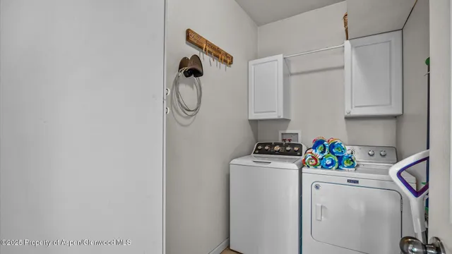 an outdoor space with furniture and umbrella