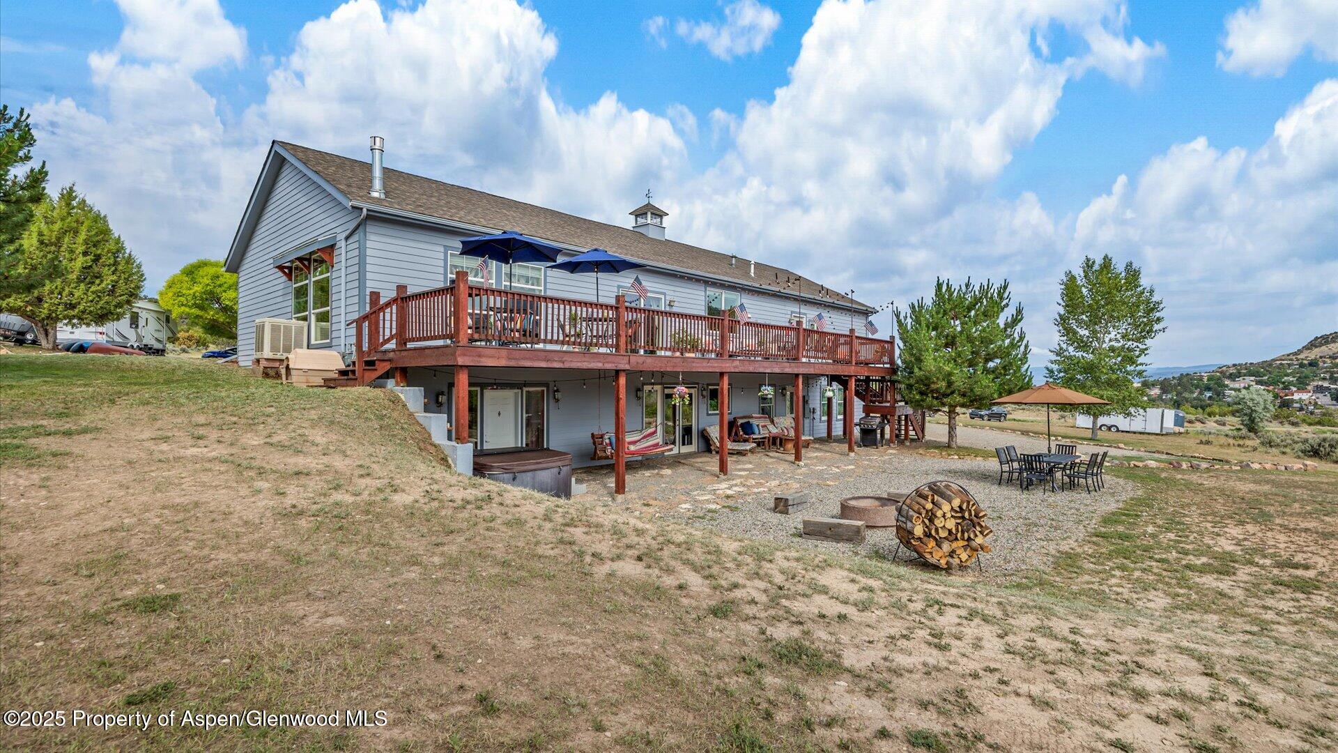40380 D Road Crawford, CO 81415 - Photo 36 of 52 a view of a house with backyard