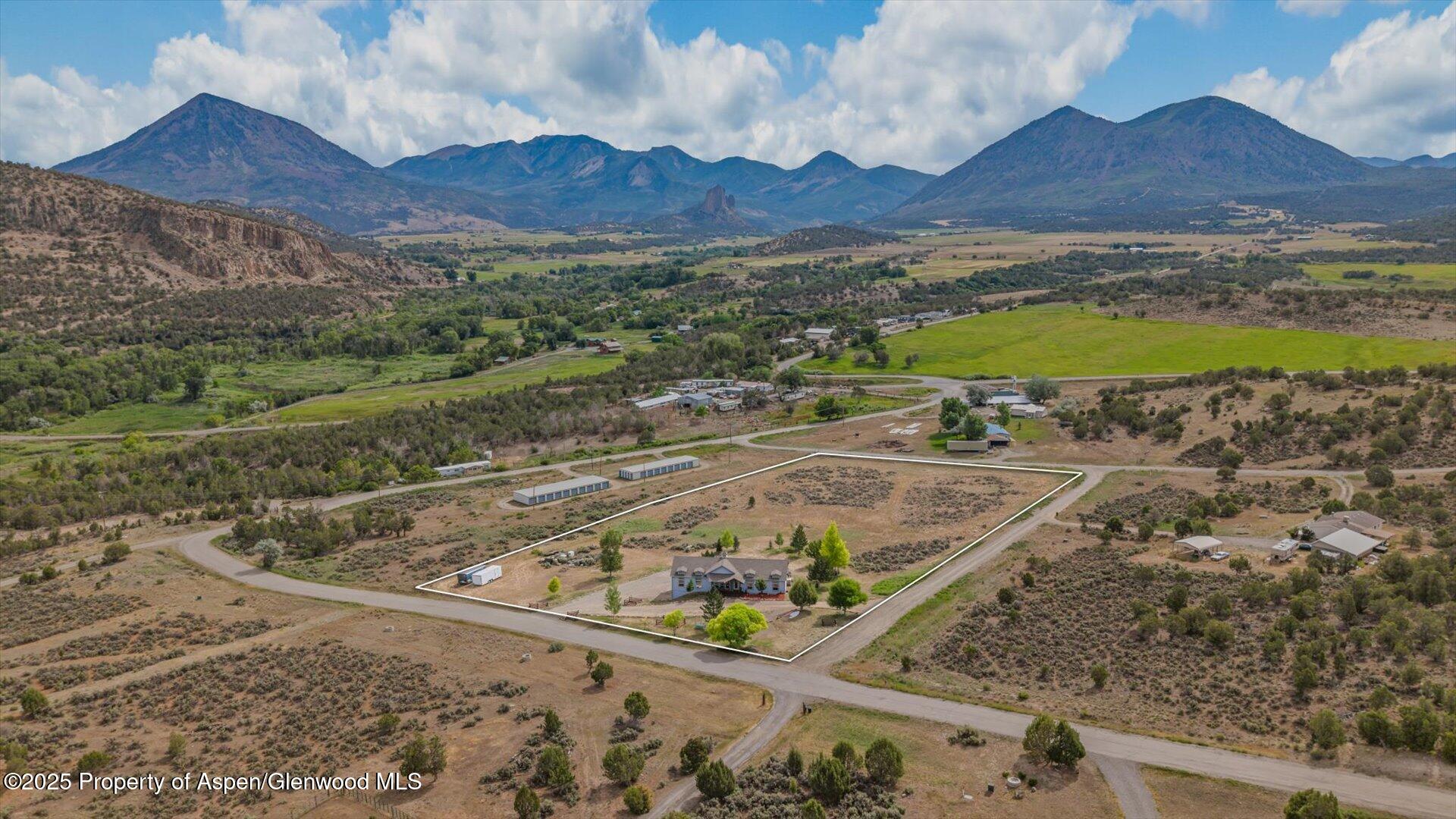 40380 D Road Crawford, CO 81415 - Photo 4 of 52 a view of a swimming pool with a mountain