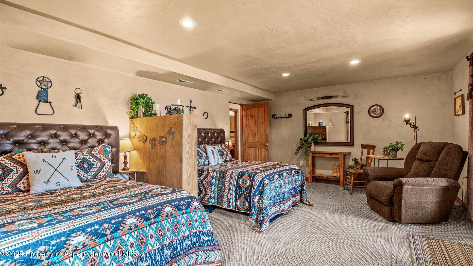 40380 D Road Crawford, CO 81415 - Photo 43 of 52 a bedroom with furniture and a large window