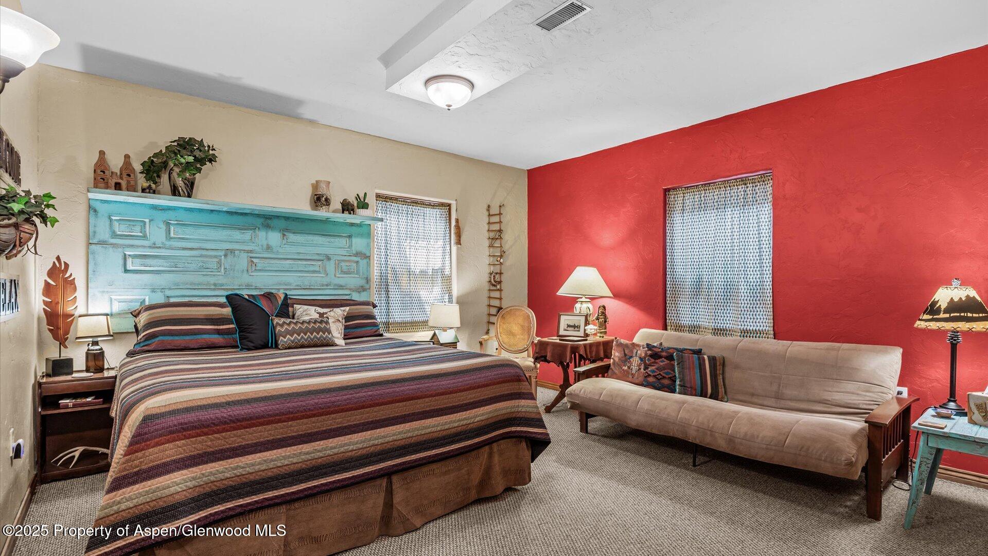 40380 D Road Crawford, CO 81415 - Photo 44 of 52 a bedroom with furniture and a lamp