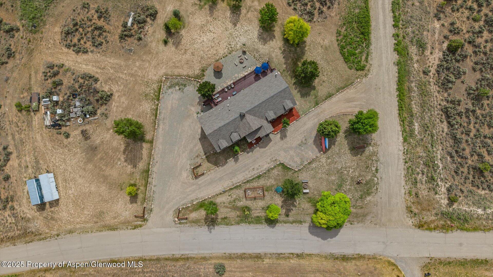 40380 D Road Crawford, CO 81415 - Photo 5 of 52 an aerial view of a house with a yard