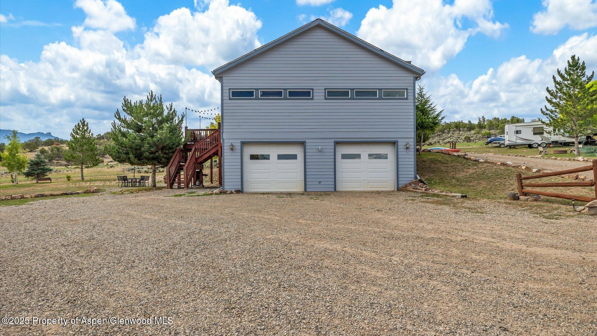 40380 D Road Crawford, CO 81415 - Photo 7 of 52 a view of a house with a yard