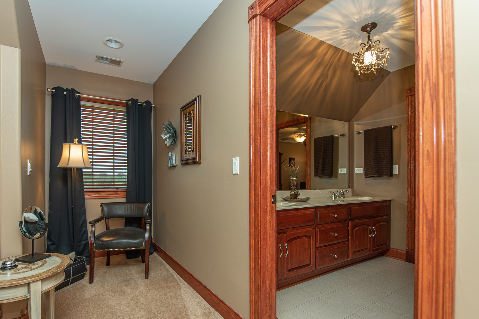 19657 West Sharp Road Elwood, IL 60421 - Photo 26 of 64 a en suite bathroom with a granite countertop sink a toilet and a mirror