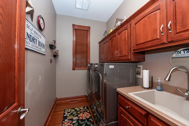 a close view of a sink and a mirror in a bathroom