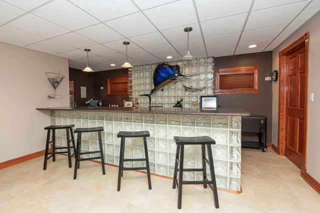a view of kitchen with cabinets and wooden floor