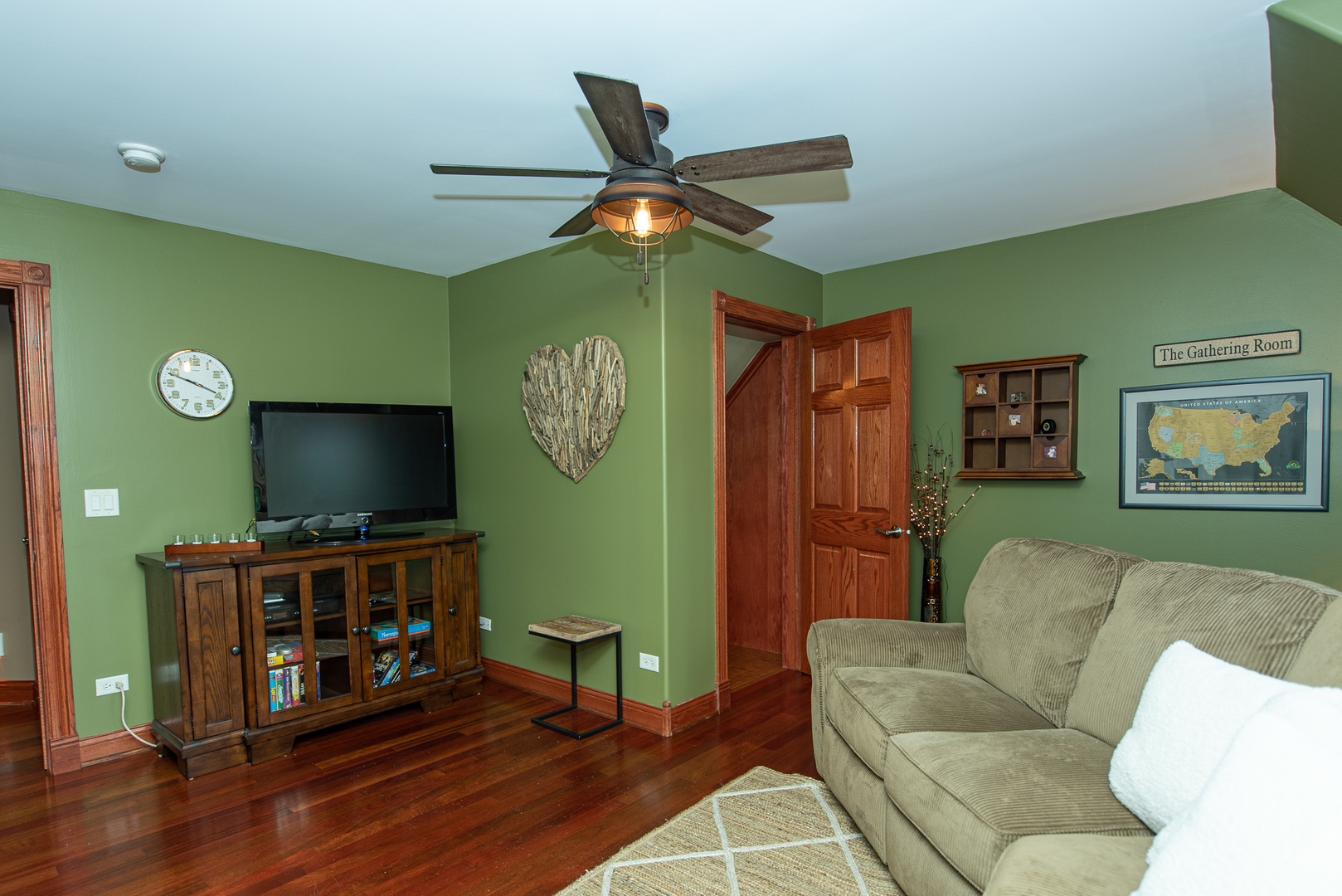 19657 West Sharp Road Elwood, IL 60421 - Photo 40 of 64 a living room with furniture and a flat screen tv