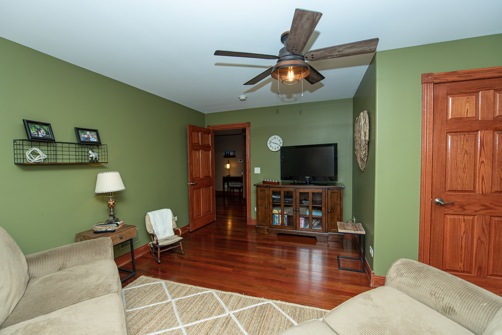 19657 West Sharp Road Elwood, IL 60421 - Photo 41 of 64 a living room with furniture and a flat screen tv