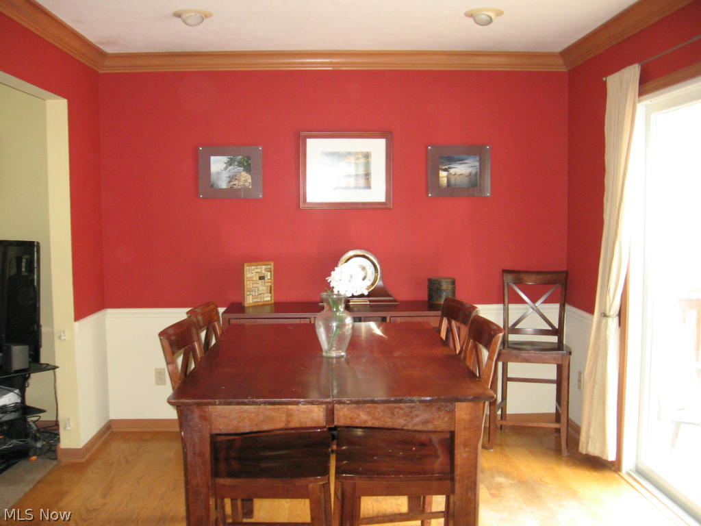 1724 Edgefield Road Lyndhurst, OH 44124 - Photo 10 of 15 Dinning room with hardwood floors and slider to deck