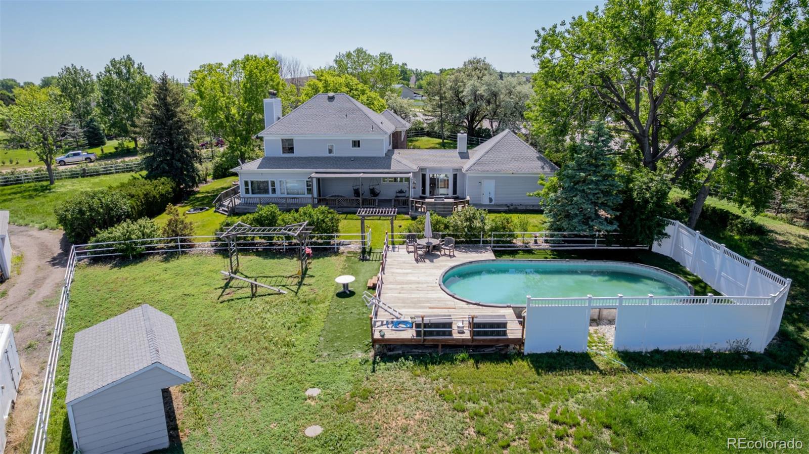 14447 Madison Street Thornton, CO 80602 - Photo 12 of 37 a aerial view of a house