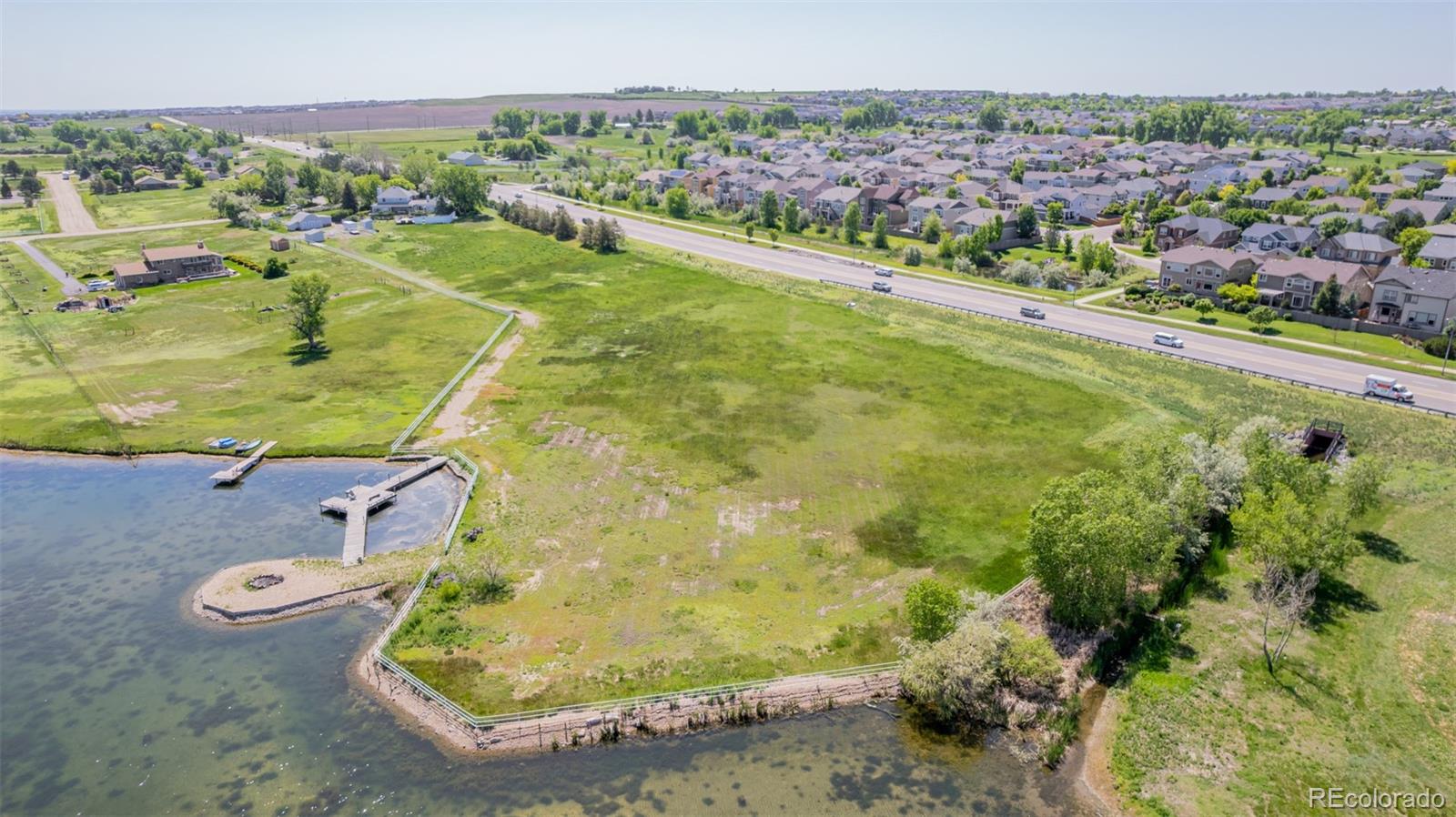 14447 Madison Street Thornton, CO 80602 - Photo 20 of 37 an aerial view of residential houses with outdoor space