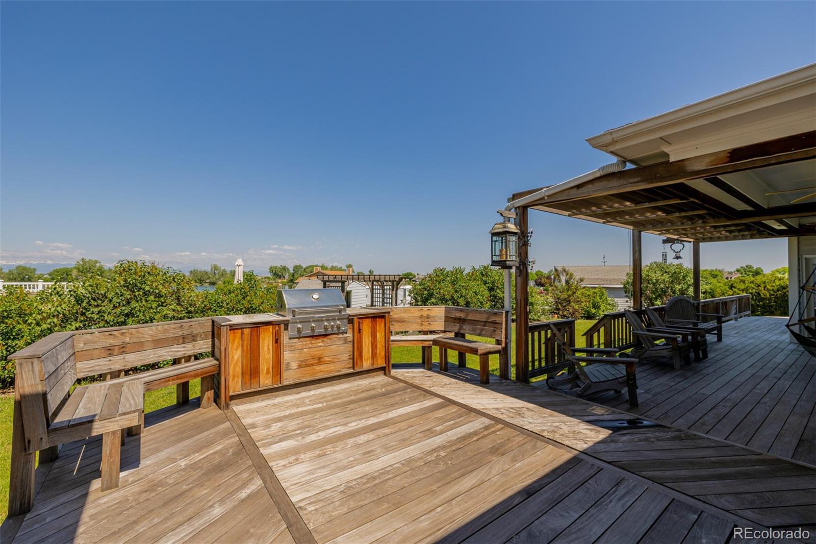 14447 Madison Street Thornton, CO 80602 - Photo 27 of 37 a view of a terrace with sitting area