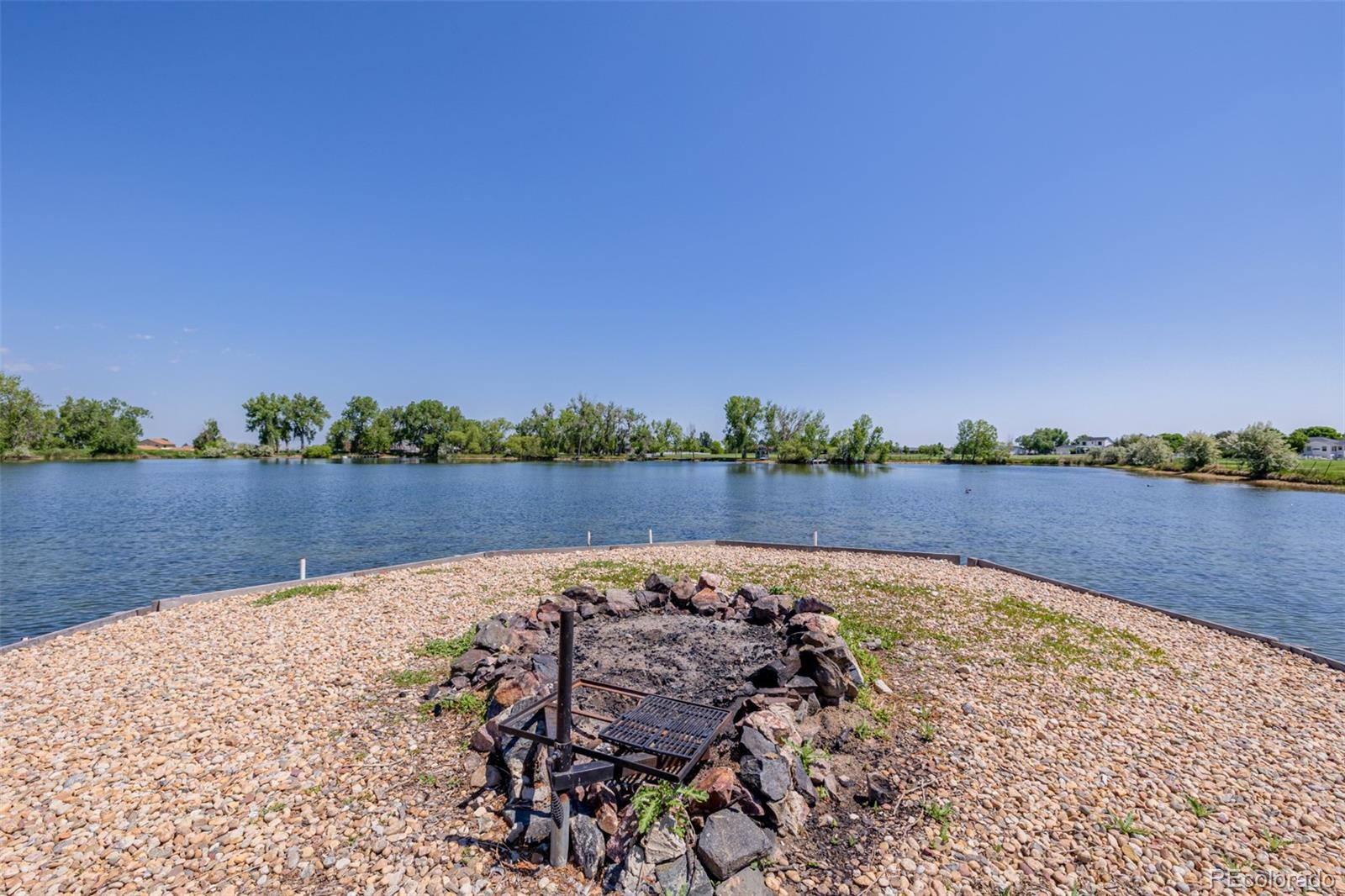 14447 Madison Street Thornton, CO 80602 - Photo 7 of 37 a view of lake with green space