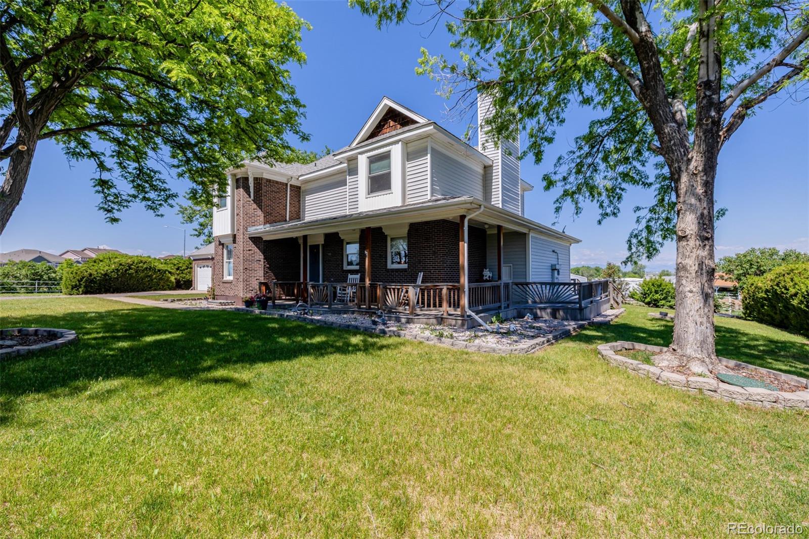 14447 Madison Street Thornton, CO 80602 - Photo 9 of 37 a view of a house with swimming pool and chairs