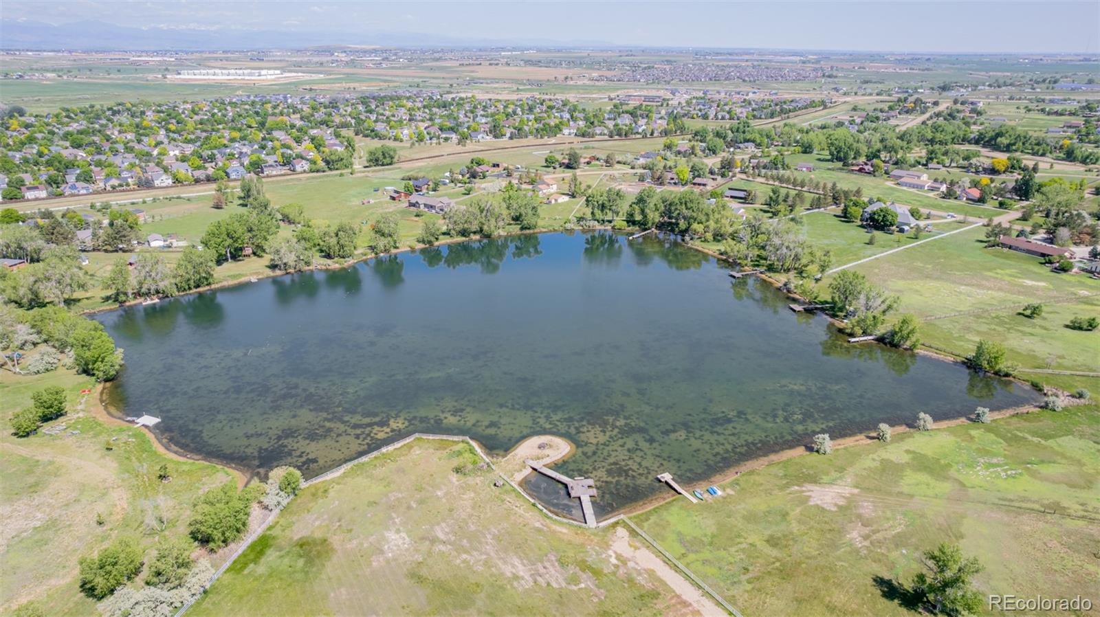 14447 Madison Street Thornton, CO 80602 - Photo 10 of 37 an aerial view of residential houses with outdoor space