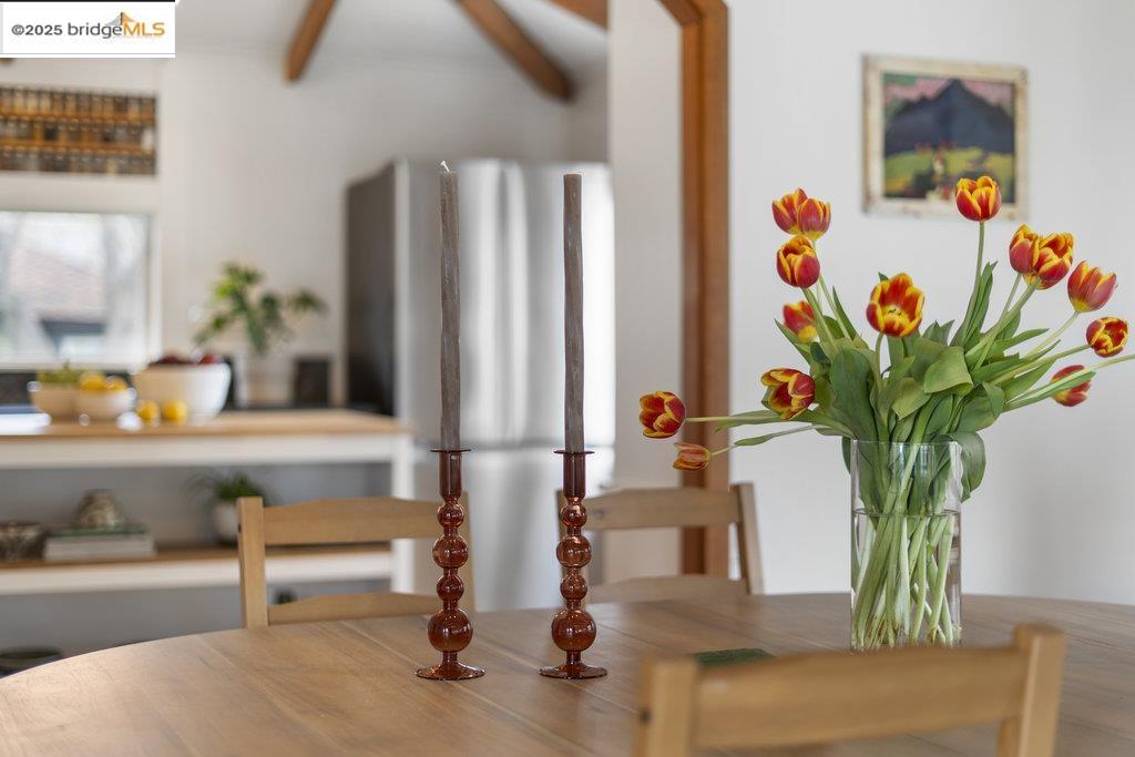 2587 Piedmont Avenue, Unit 3 Berkeley, CA 94704 - Photo 12 of 33 a vase of flowers sitting on a table with a potted plant
