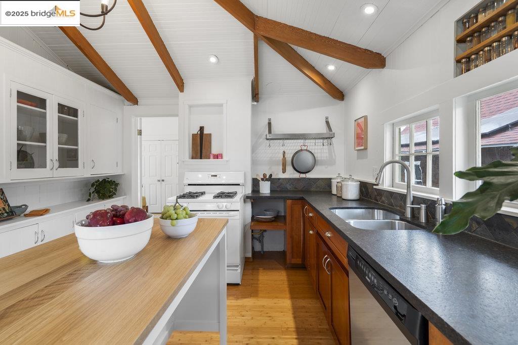2587 Piedmont Avenue, Unit 3 Berkeley, CA 94704 - Photo 16 of 33 a kitchen with stainless steel appliances granite countertop a sink stove and cabinets