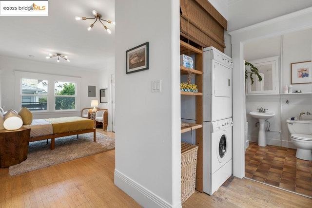 a white toilet sitting next to a bathroom sink and tub