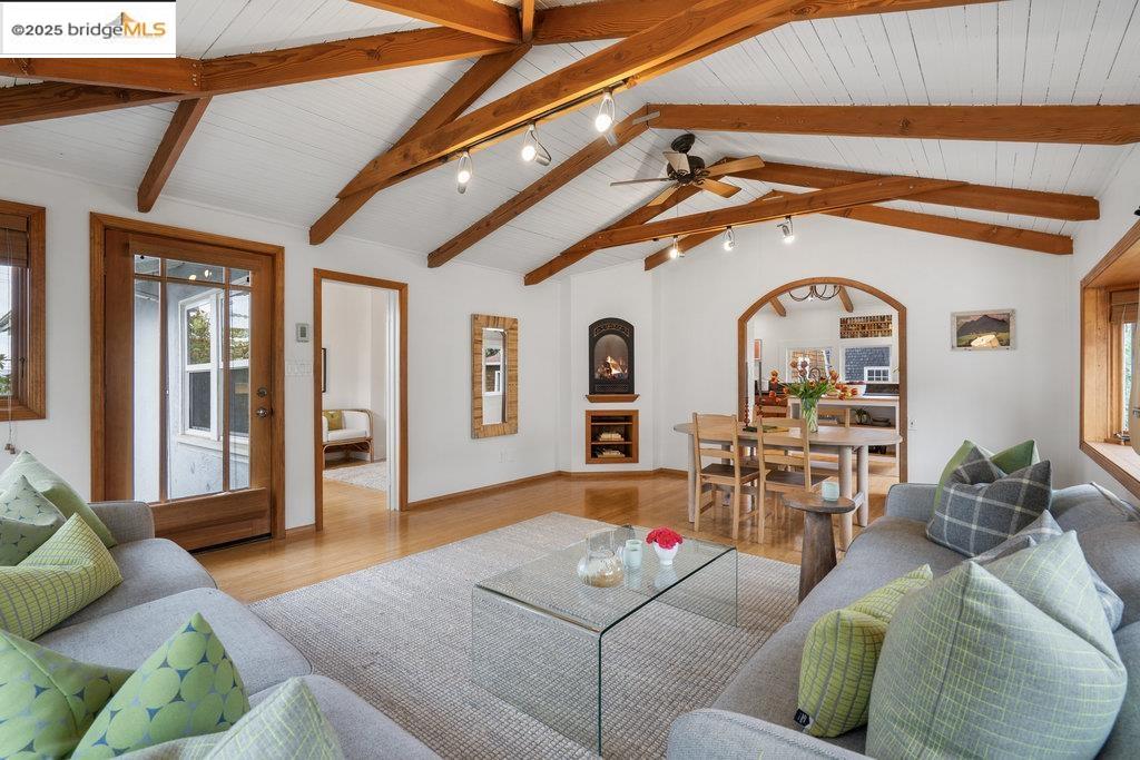 2587 Piedmont Avenue, Unit 3 Berkeley, CA 94704 - Photo 8 of 33 a living room with furniture and a chandelier