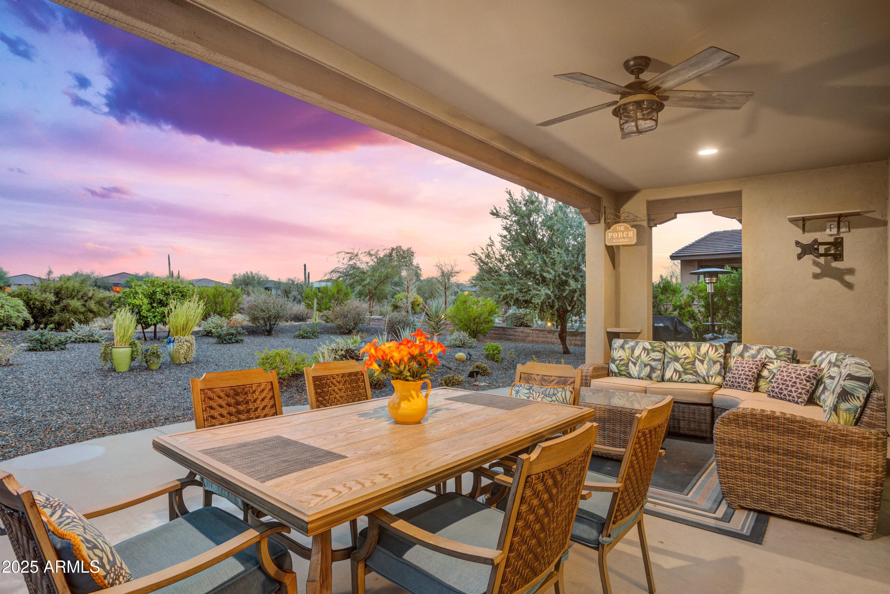 17919 East Slide Rock Drive Rio Verde, AZ 85263 - Photo 27 of 48 a outdoor dining space with furniture and a potted plant