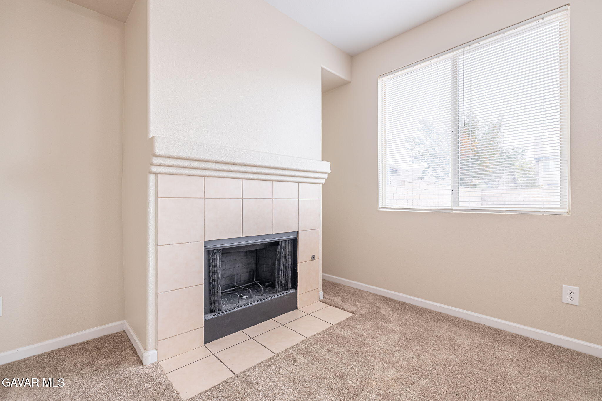 2834 Allessandra Court Lancaster, CA 93535 - Photo 2 of 51 an empty room with a fireplace