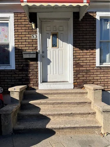 a front view of a house with a window