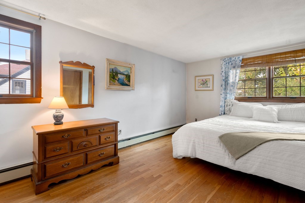 17 Centre Lane Milton, MA 02186 - Photo 15 of 26 a bedroom with a bed and a window