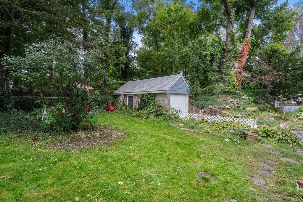 17 Centre Lane Milton, MA 02186 - Photo 21 of 26 a front view of a house with garden